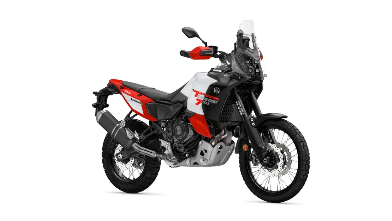 Motocykl Yamaha Ténéré 700 World Raid w kolorze białym, czerwonym i czarnym, gotowy na przygodę.