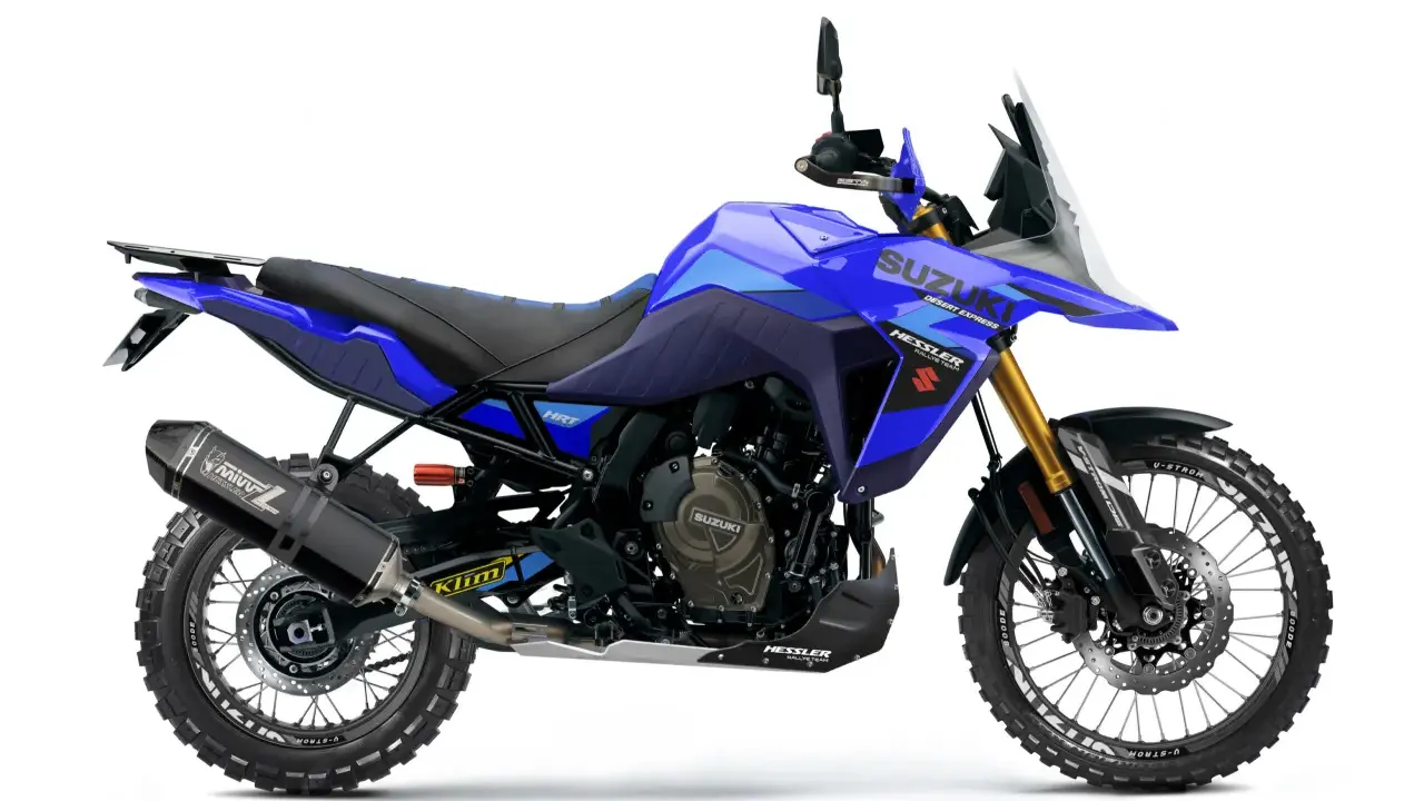 Niebieski motocykl Suzuki V-Strom 800 DE z akcesoriami, gotowy na przygodę.