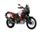 Motocykl Yamaha Ténéré 700 World Raid w kolorze białym, czerwonym i czarnym, gotowy na przygodę.