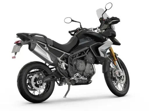 Czarny motocykl Triumph Tiger 900, gotowy na przygody. Sprawdź jego dane techniczne!