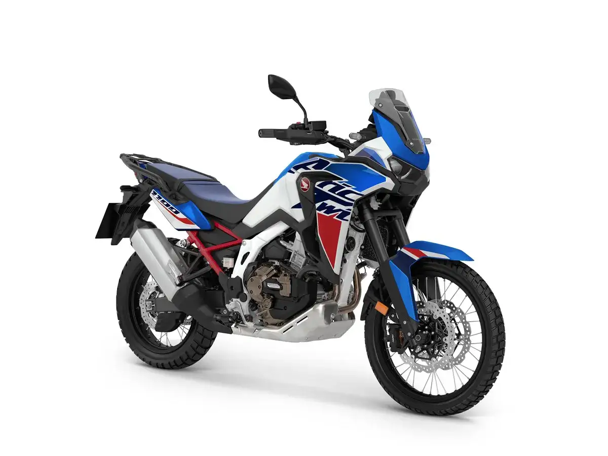 Honda Africa Twin 1100 dane techniczne: potężny motocykl turystyczny w biało-niebiesko-czerwonych barwach, gotowy na każdą przygodę.