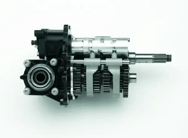 Rysunek przedstawia mechanizm skrzyni biegów w motorze, z widocznymi wałkami i zębatkami.