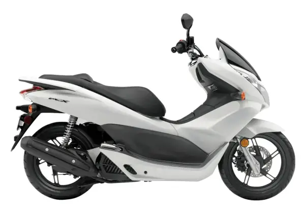 Biały skuter Honda PCX 125, idealny do miasta. Sprawdź honda pcx 125 dane techniczne i ciesz się jazdą.